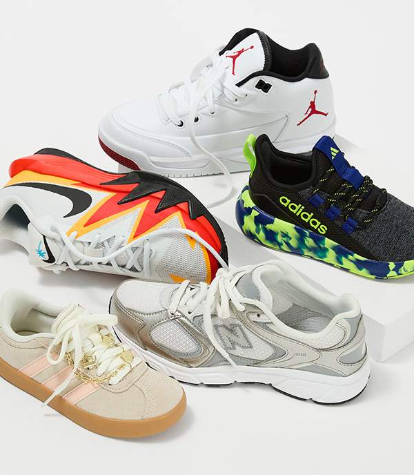 Five best valued kids shoes are randomly placed on white background