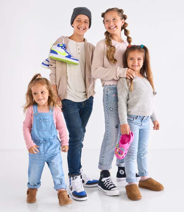 Happy kids squad wearing cute footwear from Converse, Bearpaw, Nike, and Crocs