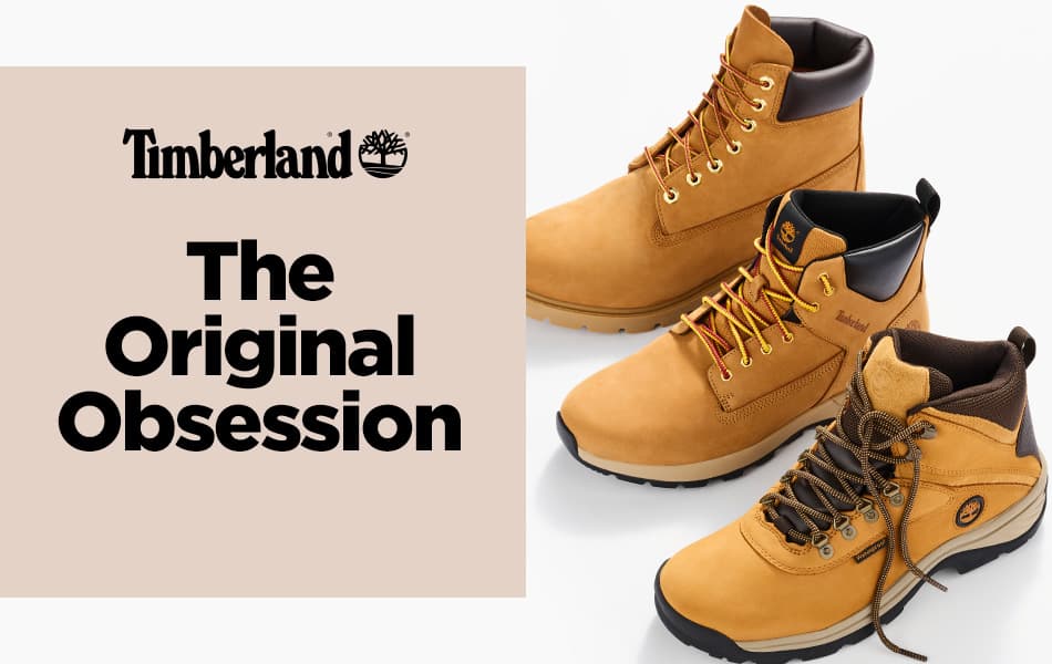 Three Timberland boots lined up in a row on a white background.