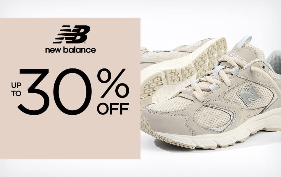 Off White Women's New Balance 408 Sneaker artfully shot on a white background.