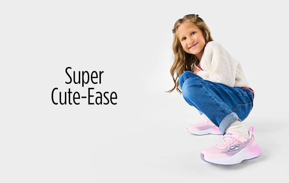 Little girl crouched down in pink Skechers sneakers with left foot out front.