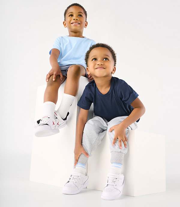 Toddlers in Jordan sneakers