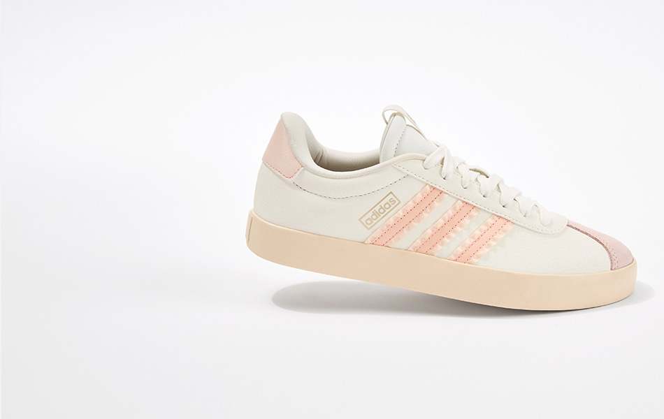 Hero shot of the white and pink women's adidas VL Court 3.0 on a white background.