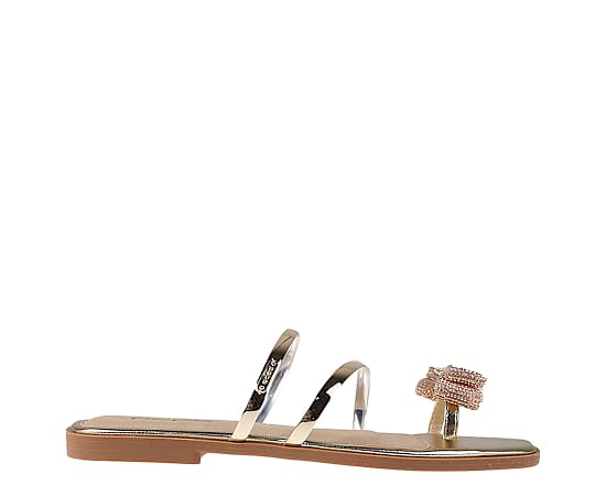 Bebe Women's Fashion Sandal with Embellished Bow Detail - Light gold