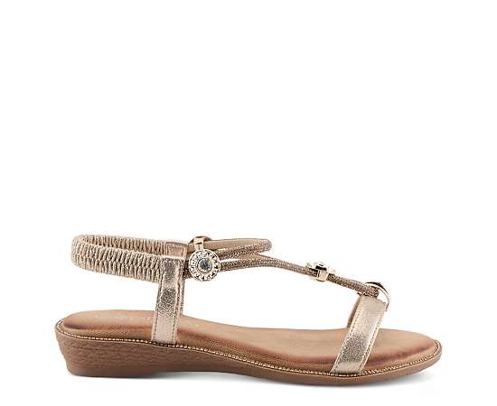 Patrizia Women's Charmer Crystal Jeweled T-Strap Flat Sandals with Stretch Back - Soft gold