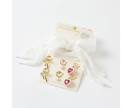 UNISEX HEARTS AND BOWS SHOE CHARMS 4 PACK