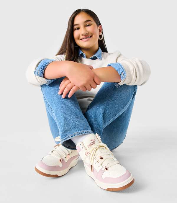 Young women wearing fashion sneaker from Puma